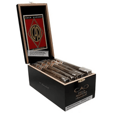 Load image into Gallery viewer, Medium flavor CAO Gold Maduro Corona Gorda cigar with dark, oily wrapper and detailed band, resting on a wooden surface.