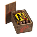 A Alec Bradley Black Market Vandal Perfecto medium flavor cigar with a dark wrapper, displayed on a wooden surface.