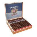 Alec Bradley Superstition Churchill medium flavored cigars with dark brown wrapper and branded band, resting on a wooden surface.