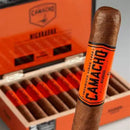 Sweet flavored Camacho Nicaragua Toro cigar displayed in a box, showcasing its dark wrapper and detailed band.