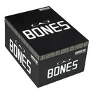 Medium flavored CAO Bones Bind Hughie Toro cigar with detailed wrapper and band, displayed on a wooden surface.