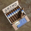 Nicaraguan Diesel Grind Robusto coffee-infused cigar with dark wrapper and premium tobacco, resting on a wooden surface.