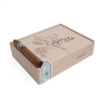 Load image into Gallery viewer, Fighting Cock Torpedo medium flavor cigar with a dark wrapper resting on a wooden surface.

