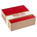 Herrera Esteli Robusto Piramide Fino medium-flavored cigars with dark brown wrappers and elegant band, displayed on a wooden surface.
