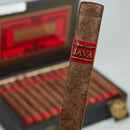 Coffee-infused Java Red by Drew Estate Corona cigar, showcasing its rich wrapper and detailed band in natural lighting.