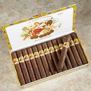 Full flavored La Gloria Cubana Churchill Natural cigar pack with five cigars, showcasing rich tobacco leaf wrappers.