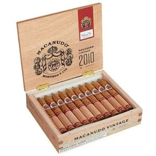 Load image into Gallery viewer, Medium flavored Macanudo Vintage 2010 Torpedo cigar from Dominican Republic, showcasing the cigar's shape and rich wrapper.
