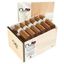 Nub by Oliva 464 Cameroon Torpedo medium flavored cigar with a smooth, dark wrapper and tapered tip, displayed on a wooden surface.