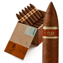 Oliva Nub 464 Torpedo Habano medium-flavored cigar with dark wrapper, displayed on a wooden surface.