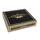 Alec Bradley Puck Churchill medium flavor cigar showing the dark wrapper and band, resting on a wooden surface.