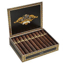 A Alec Bradley Toro Puck cigar with medium flavor, displayed on a wooden surface with packaging in the background.