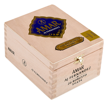 Load image into Gallery viewer, Medium flavored Amar by AJ Fernandez Torito Toro Extra cigar resting in a wooden box.
