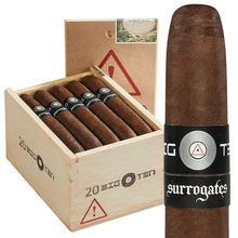 Load image into Gallery viewer, Coffee-infused Surrogates Skull Breaker cigar by L'Atelier, featuring rich coffee flavor and detailed cigar packaging.
